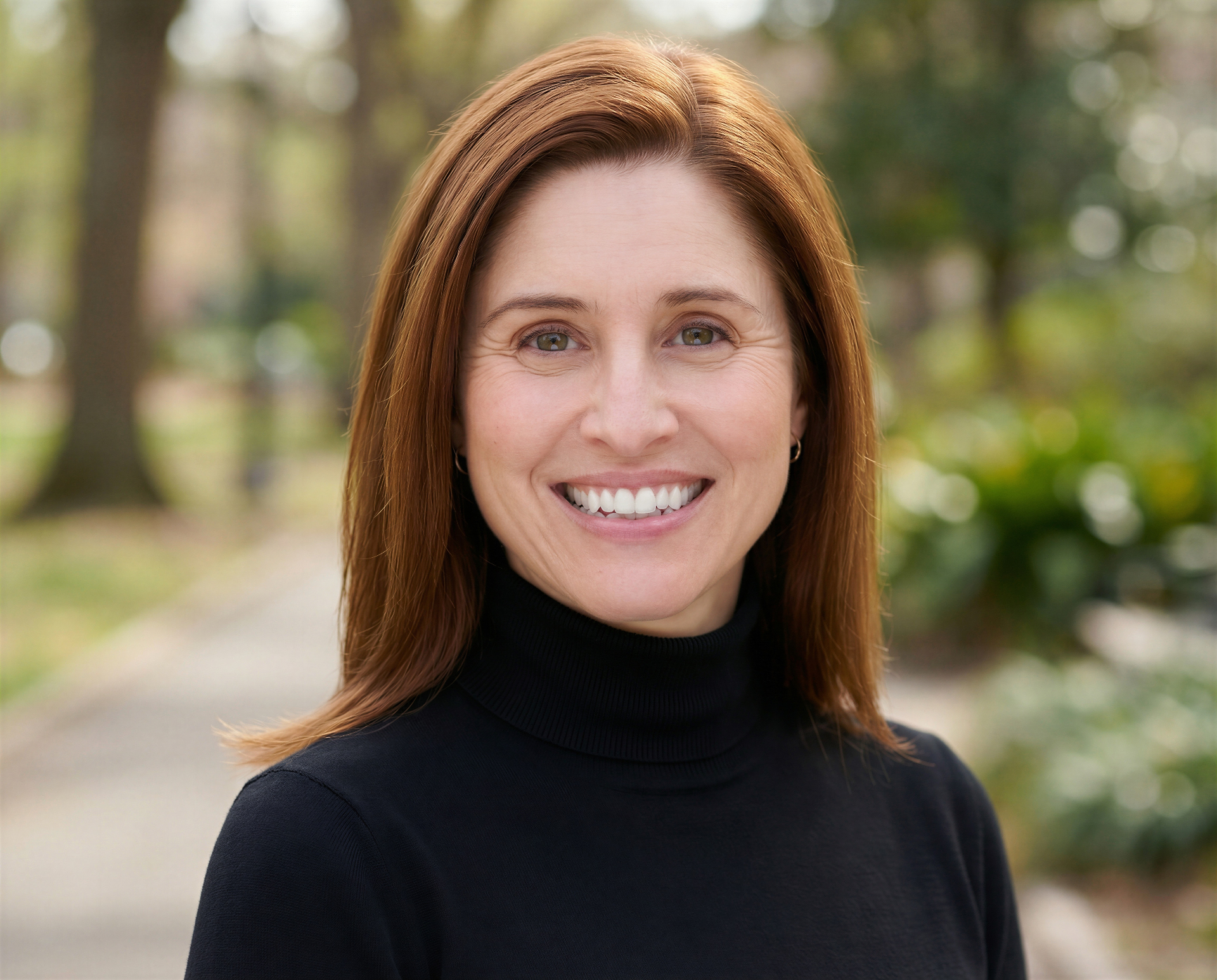 Portrait of Sara, founder of Evergreen Legacy Law